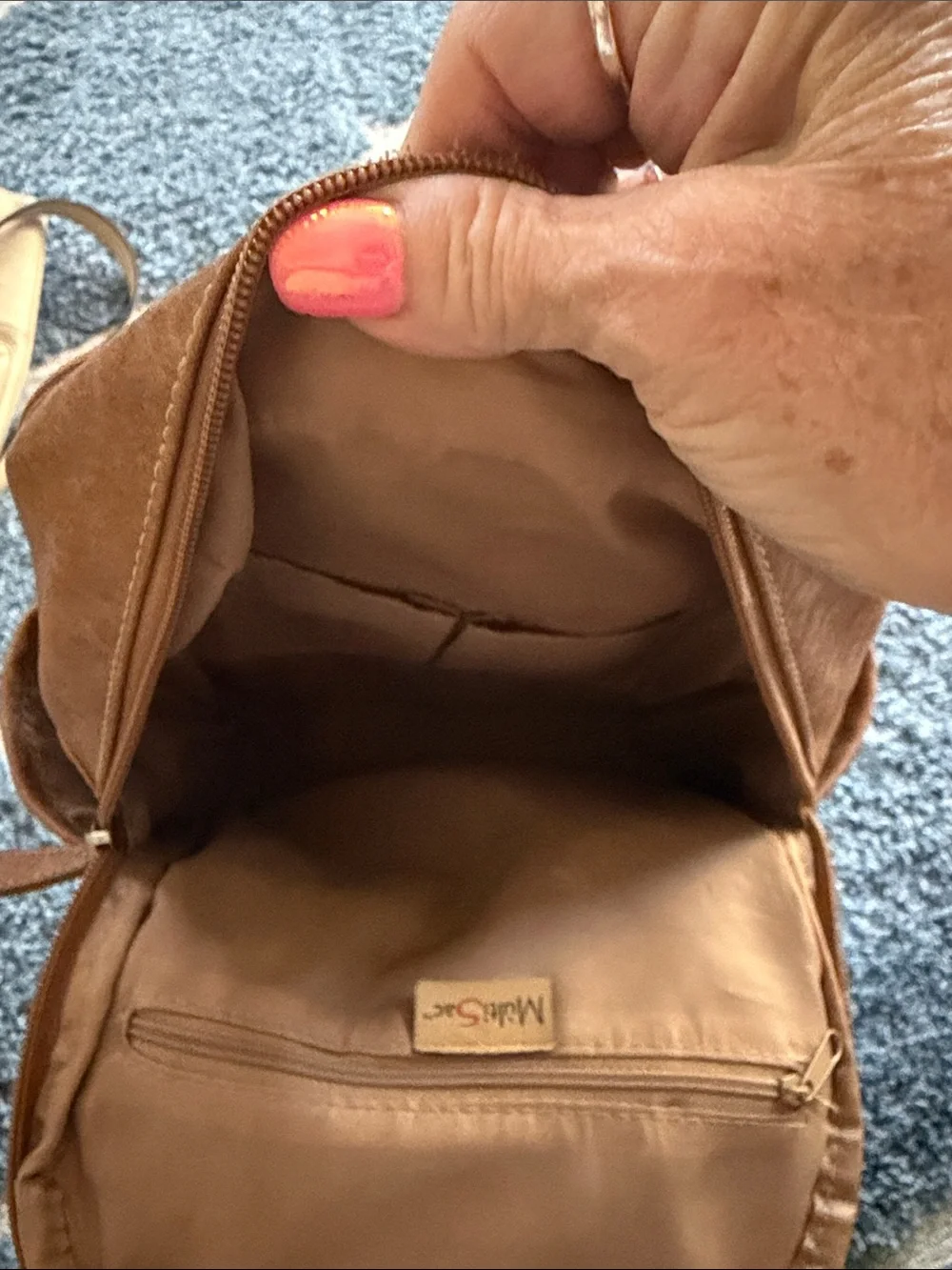 Gently Used..Tan Leatherette Mini Backpack